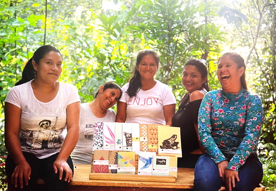 Ladies in Peru with their paper products
