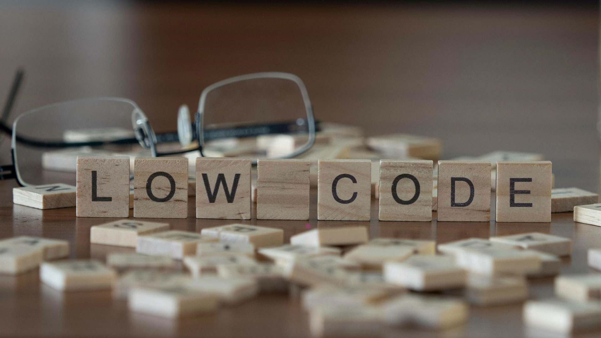 low code concept represented by wooden letter tiles