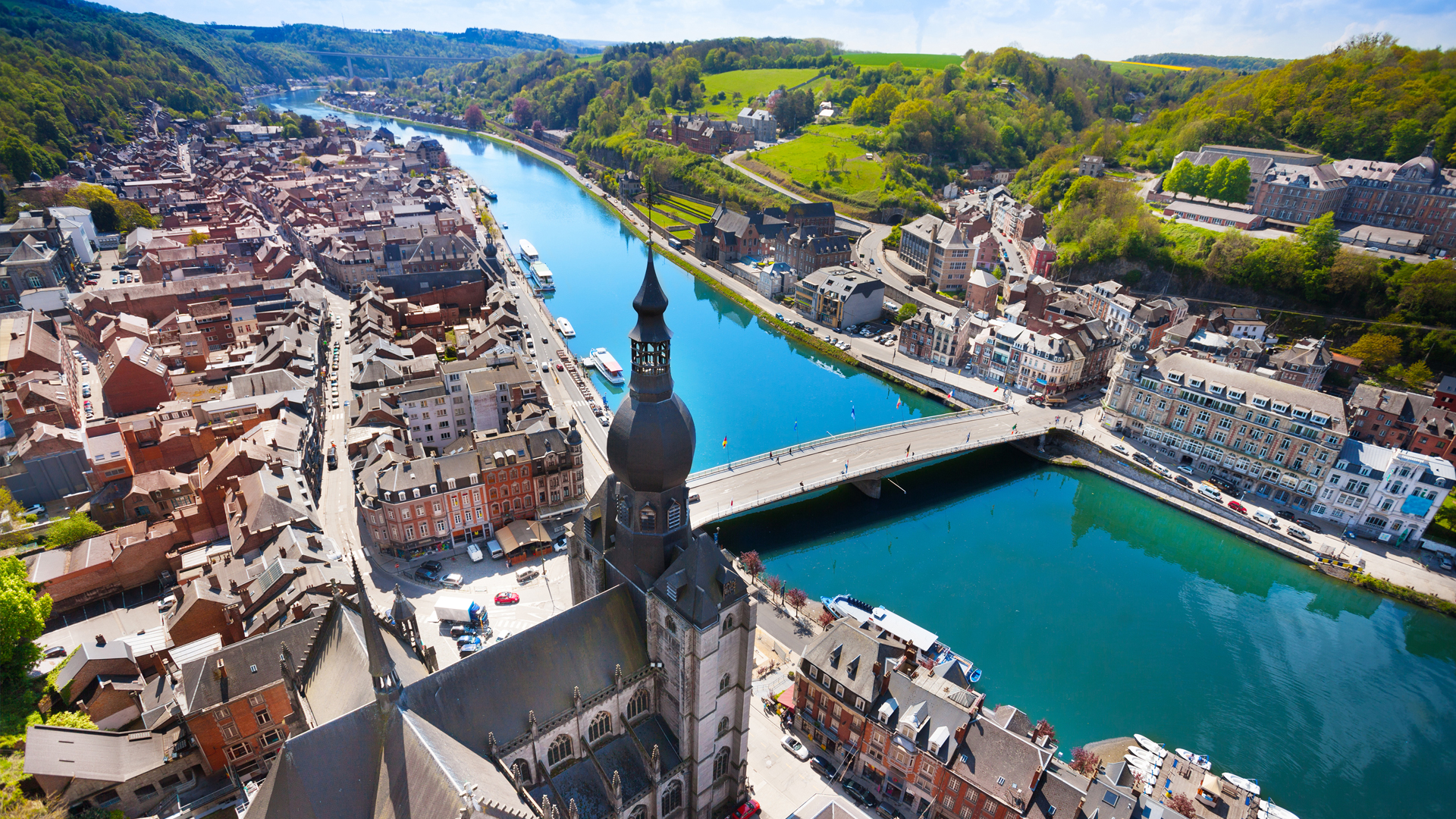 Scenic aerial view of a European city with wide river flowing through